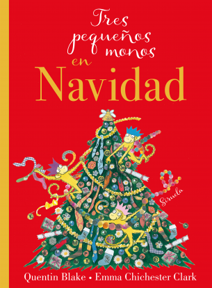 Tres pequeos monos en Navidad